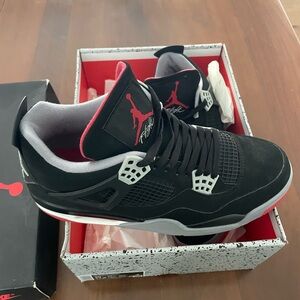 Jordan Black and Red Retro 4 Sneakers